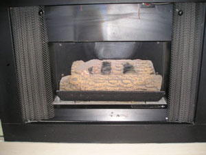 fake log ventless fireplace conversion to modern fireglass fireplace